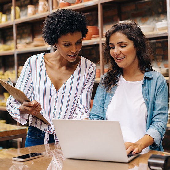 Business owners reviewing their Business Internet