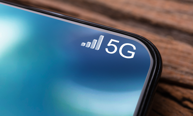 Closeups Photo Of Mobile Phone Connected To 5G Network