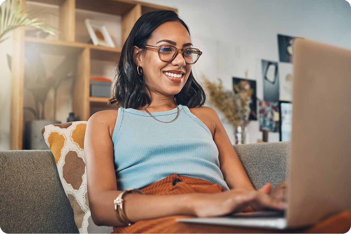 Woman enjoying fast Internet connection on her laptop