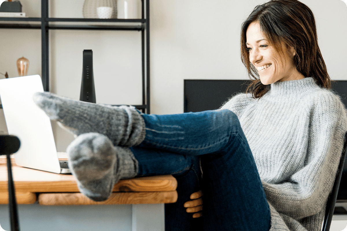 Woman using Laptop to search the Internet