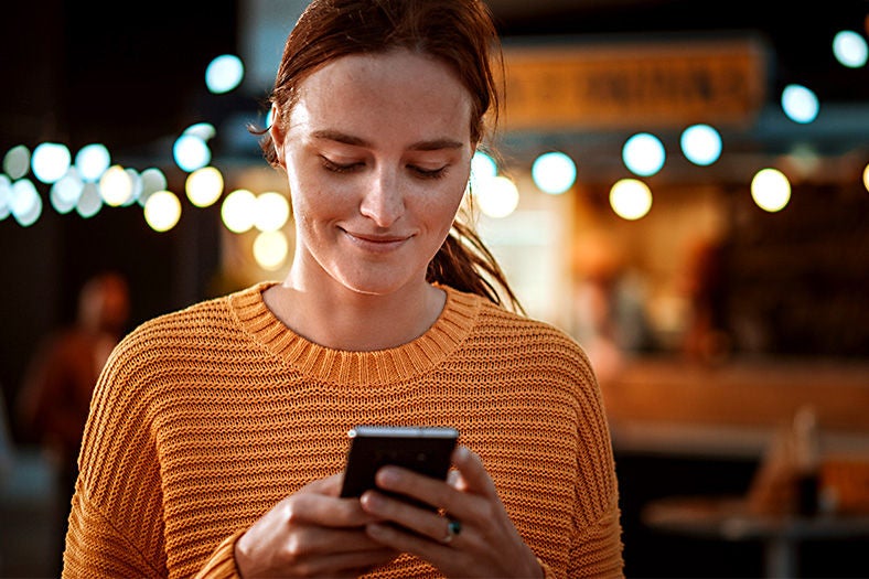 Woman checking her Android phone