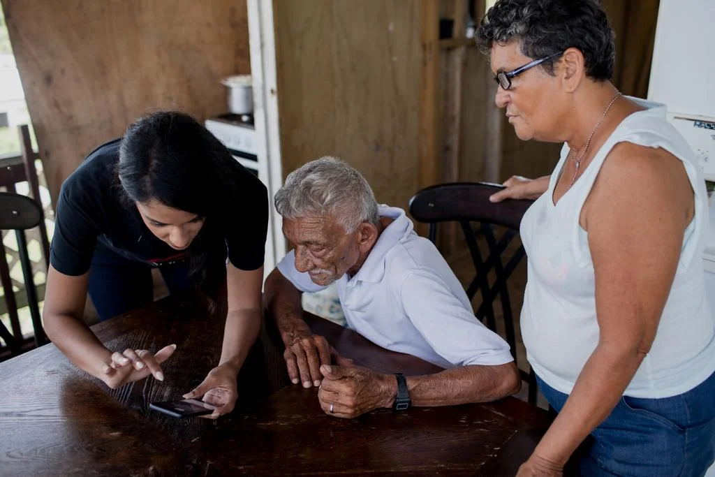 Senior citizens using phone