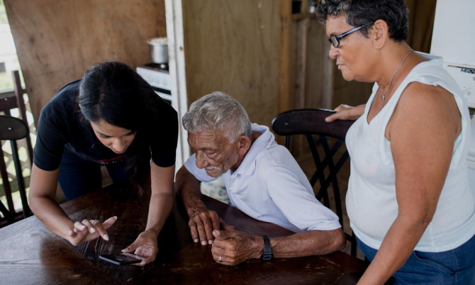 Senior citizens using phone