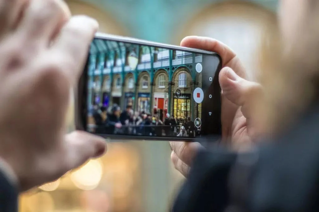  person taking photo with phone