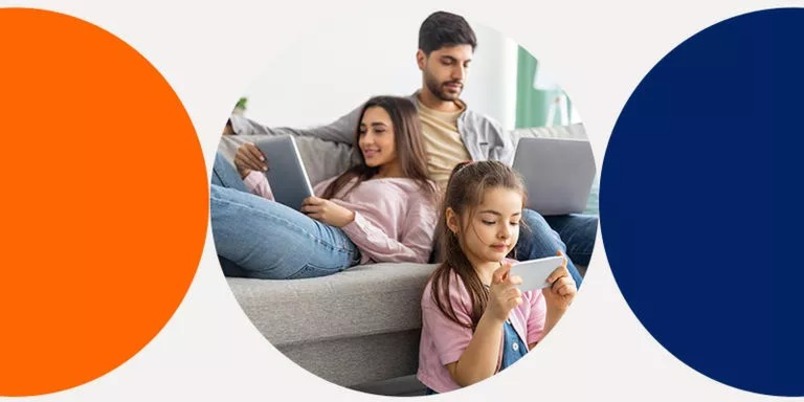 Family relaxing with phones